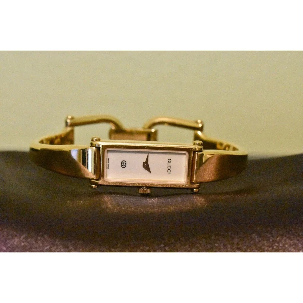 Vintage Gucci 1500L Ladies Gold Tone Bangle Watch Cream Dial Swiss Quartz